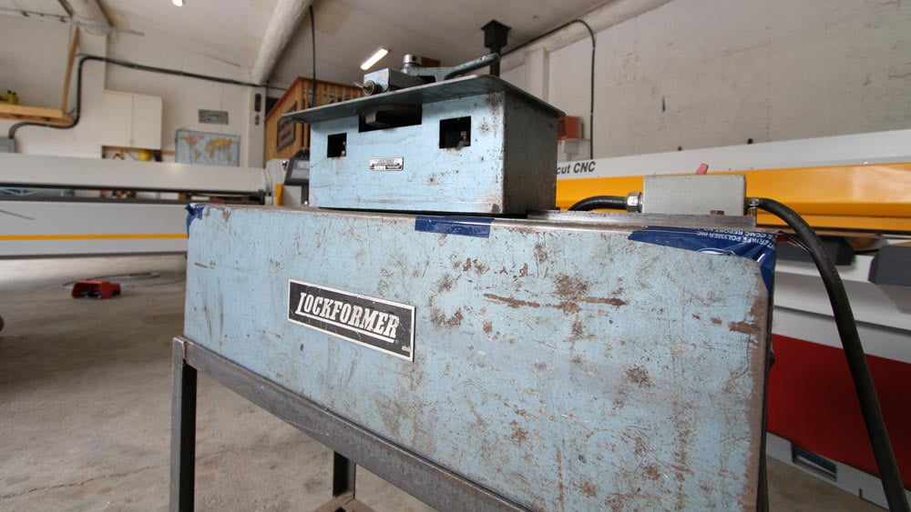 Matt Cladd in house Shop Fabrication Pitsburgh Lock Former.
